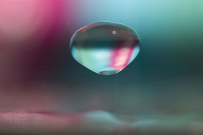 Close-up of bubbles against sky