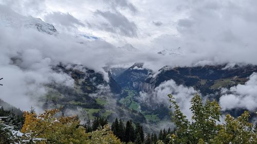 Snowy peaks and grass valleys