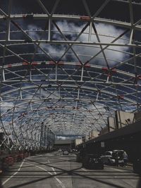 Cars parked on road in parking lot