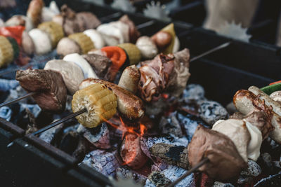 Close-up of meat on barbecue grill