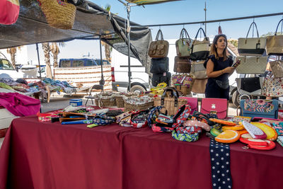 Woman standing in a market stall