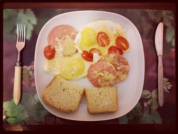 Close-up of breakfast served on table