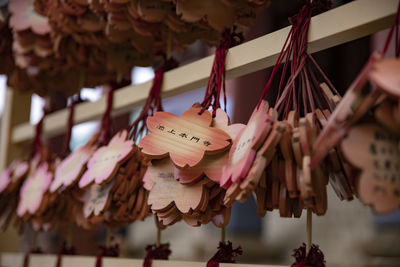 Close-up of bananas hanging for sale