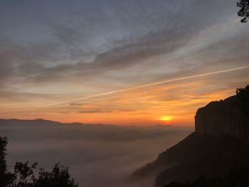 Scenic view of dramatic sky during sunset