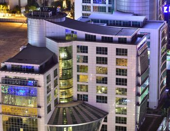 Buildings in city at night