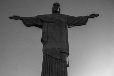 Low angle view of statue against sky
