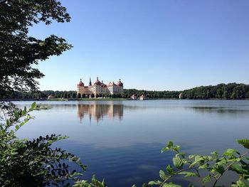 Reflection of built structure in calm lake