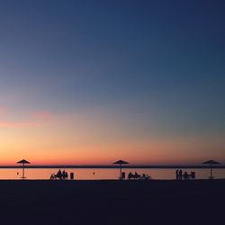 Silhouette of people on beach