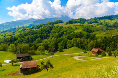 High angle view of trees and mountains against sky