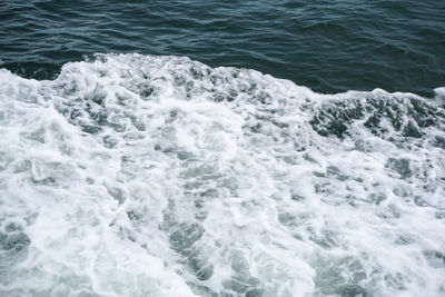 High angle view of surf on beach