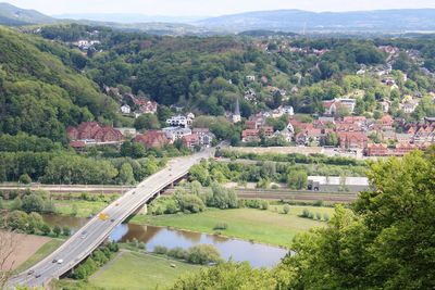 High angle view of townscape by trees and houses