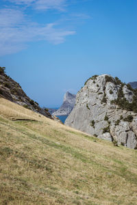 Scenic view of landscape against blue sky