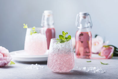 Close-up of pink roses on table