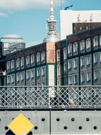 Buildings in city against sky