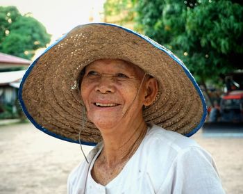 Smiling senior man wearing hat