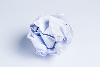 High angle view of paper against white background