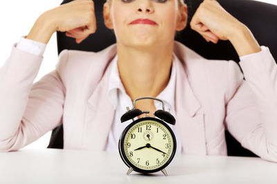 Portrait of young woman with text on table