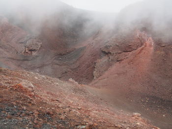 View of volcano in foggy weather