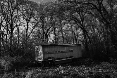 Abandoned vehicle on field