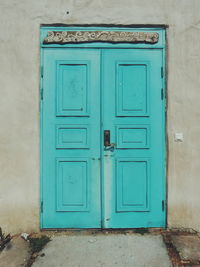 Closed blue door of house