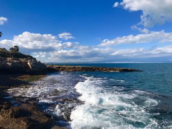 Sicilian coast, waves crashing on the rocks