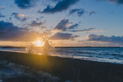 Scenic view of sea against sky during sunset