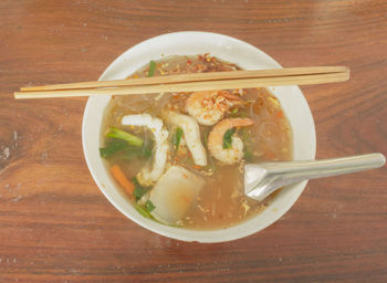 Close-up of soup served on table