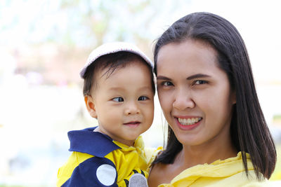 Portrait of smiling mother and son