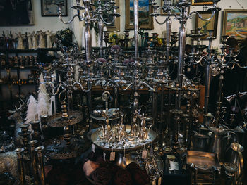 Close-up of antiques for sale at store