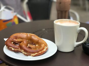 Close-up of coffee served on table