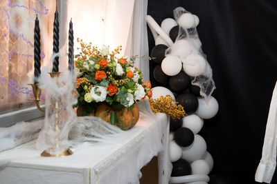 White flowers in vase on table