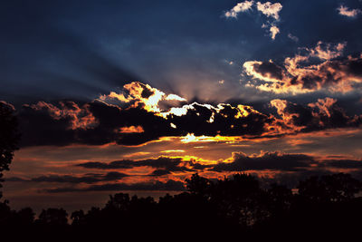 Scenic view of dramatic sky during sunset