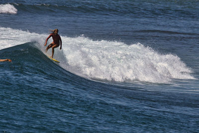 Man surfing in sea