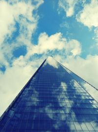 Low angle view of skyscraper against sky