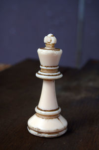 Close-up of chess pieces on table