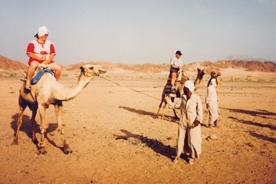 Group of people on desert