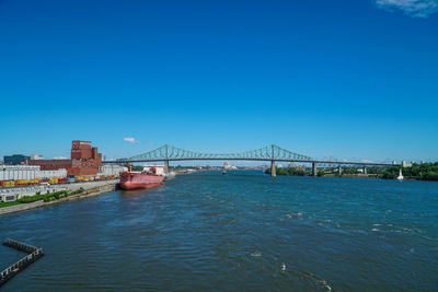 View of suspension bridge over river