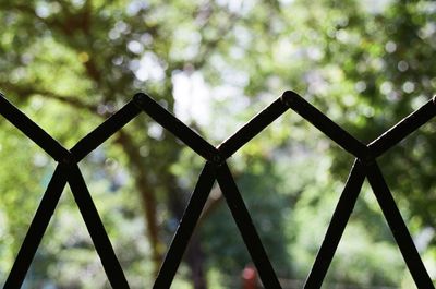 Close-up of metal structure against sky