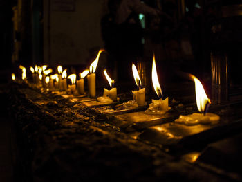 Burning candles in temple