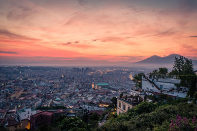 Cityscape against sky during sunset