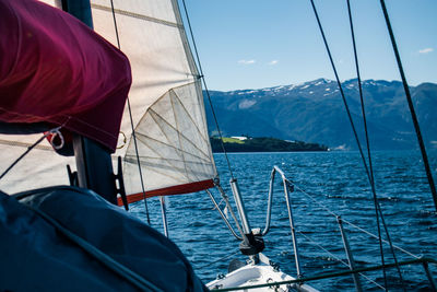 A view from a sailing boat cruising the norway fjords. sailing vessel in the fjord.