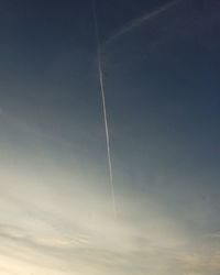 Low angle view of vapor trail in sky