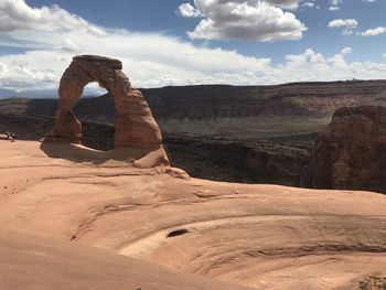 Rock formations in desert against sky arches park national moab utah