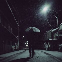 Illuminated street light at night