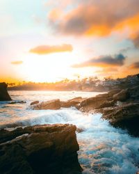 Scenic view of sea against sky during sunset