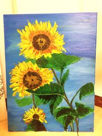 Close-up of sunflower against sky