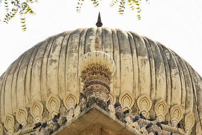 Low angle view of ornate building against clear sky