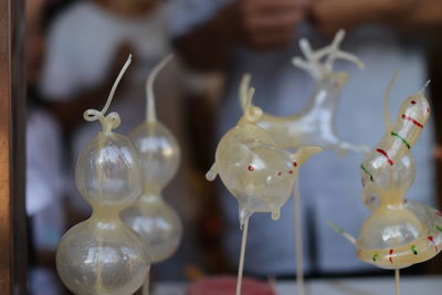 Close-up of toys for sale in market