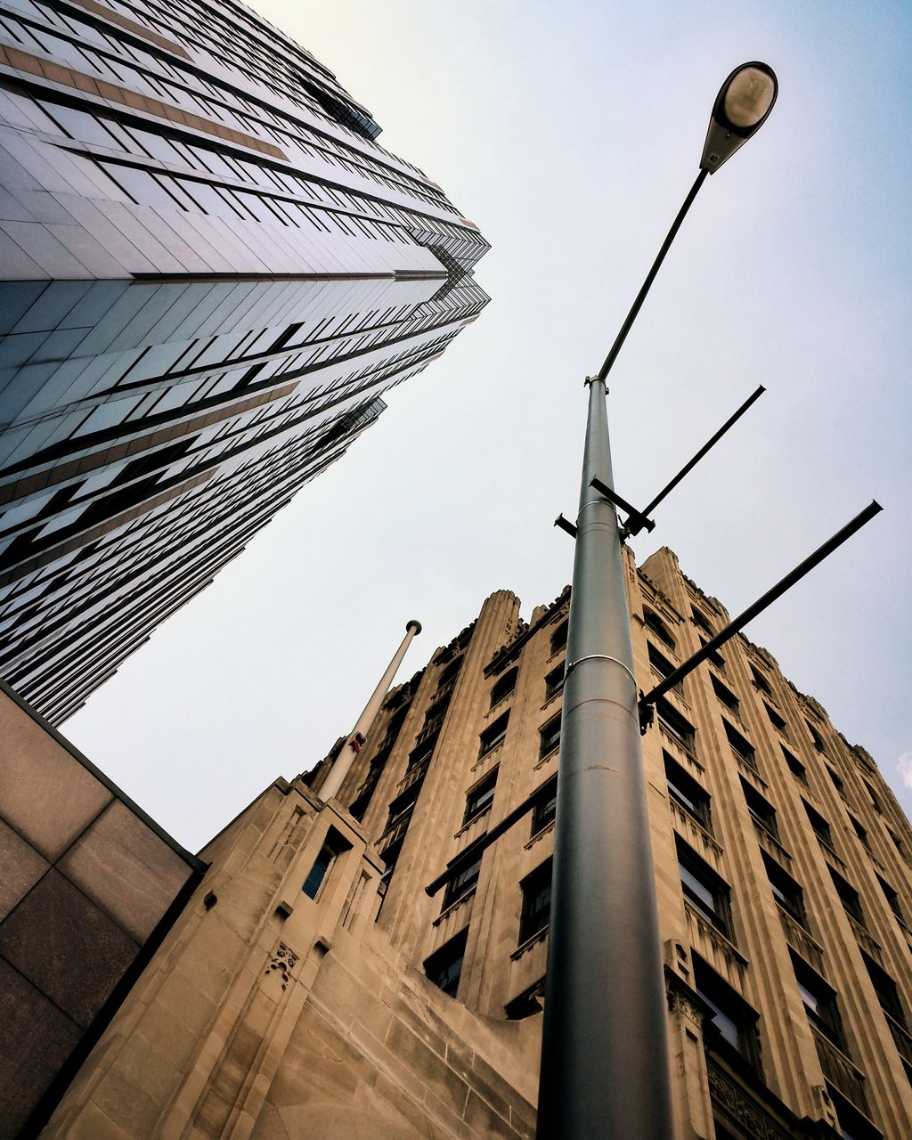 LOW ANGLE VIEW OF BUILDINGS AGAINST SKY