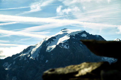 Scenic view of snowcapped mountains against sky